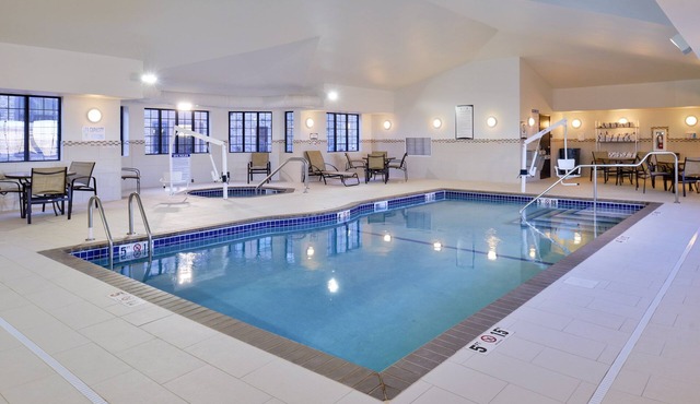King Suite in Rochester | Free Breakfast + Shared Pool & Hot Tub. Great for Business Travelers!