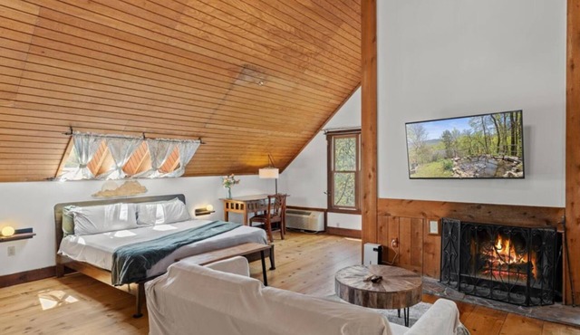 King Suite w/Skylights | Sofa Lounge | Balcony + Trees