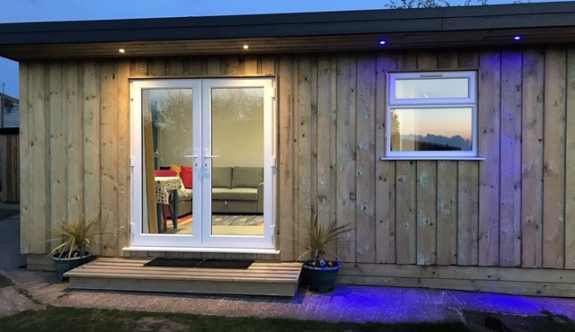 Kingfisher - our cosy, spacious glamping cabin at Mena Farm, Cornwall