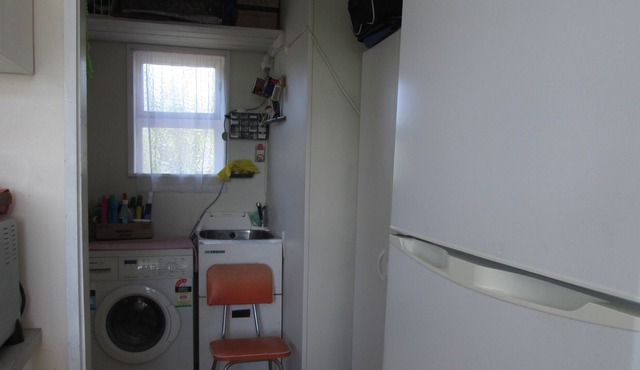 Kiwi bach with beach views.