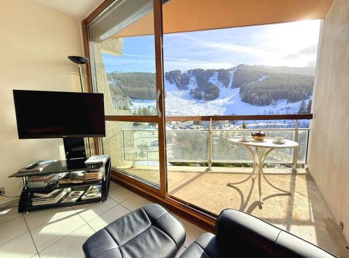 L'apesanteur, skis au pied, vue forêt, T3 cosy