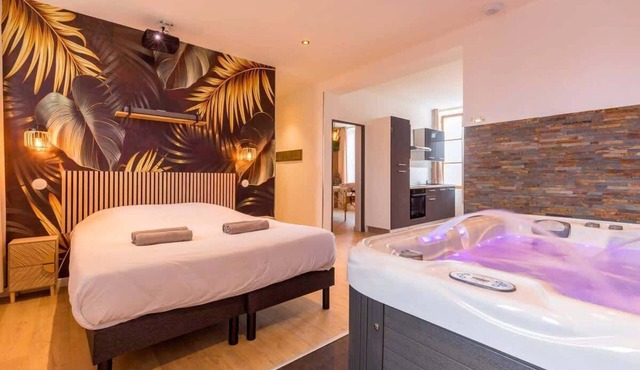 L'essentiel- Appartement avec Jacuzzi et Sauna et table de massage - SR Loc
