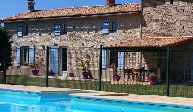 La Ballerie farmhouse & gîte. Heated pool and games barn in walled garden.