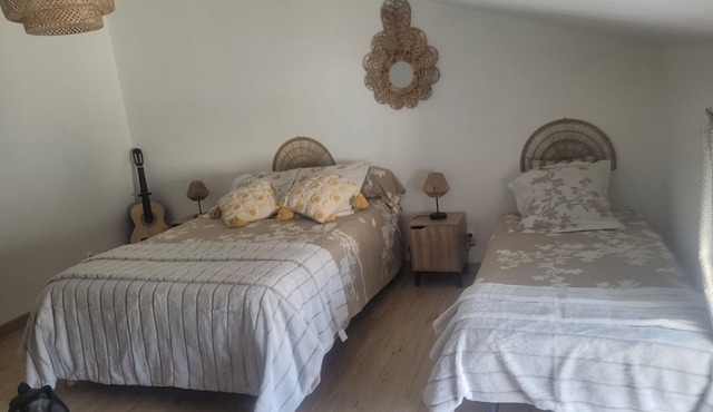 La Cadole House surrounded by a vineyard. Panoramic trails.