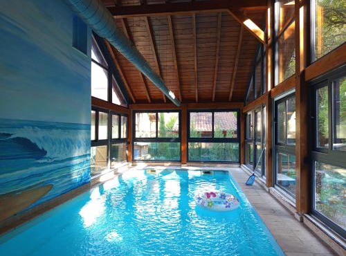 La Casa Malvarrosa- piscina climatizada