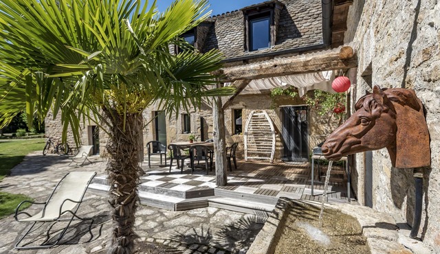 La Case à Tom with enclosed wooded park, private swimming pool, children's playground in Lozère