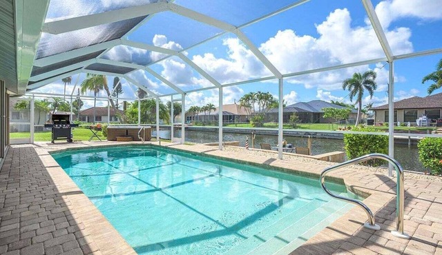 La Florida, a spacious 3-bedroom home in SE Cape Coral with a serene freshwater canal view.