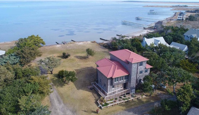 La Fortezza: Soundfront, large yard, covered porches, small dock.