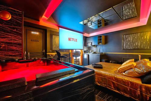 LA GOLDEN ROOM - Suite de Luxe avec Jacuzzi