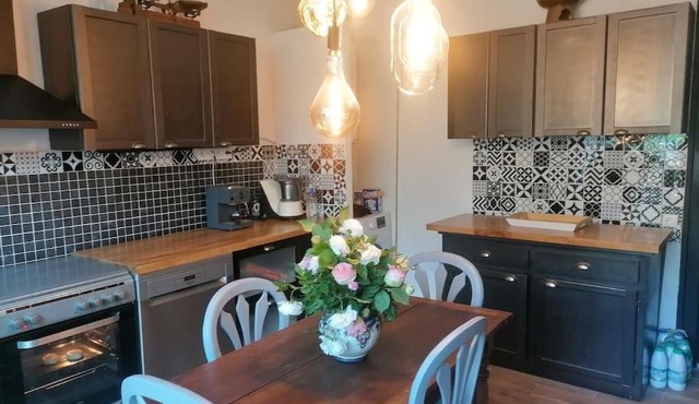 La maison ouverte avec cheminée extérieure et SPA