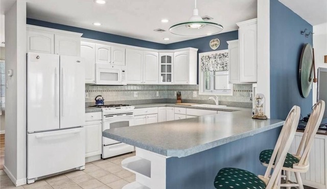 LAGOON FRONT 4 BEDROOM HOME!