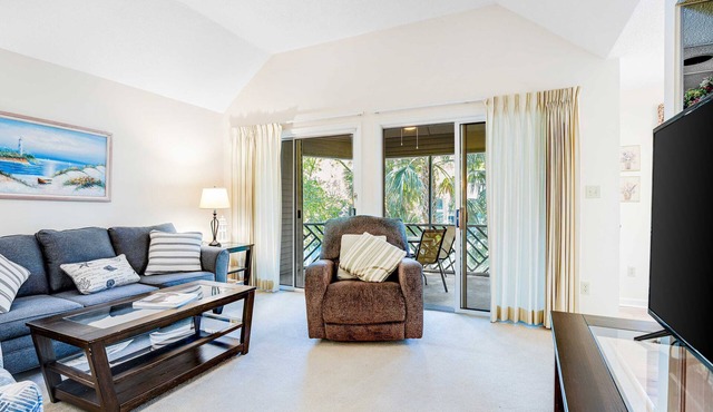 Lagoon view, second floor villa w/screened in porch, short walk to the beach