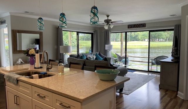 Lake and Golf Course Views at this Coastal Retreat!