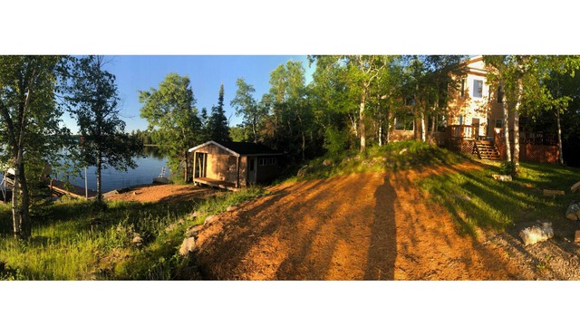 Lake cabin on 5 acres and 780' of shoreline on an island with panoramic views.