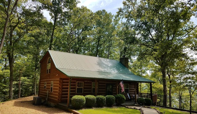 Lake Cumberland custom log cabin home on 32 wooded acres