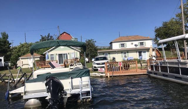 Lake Front 1 bedroom upstairs apartment above 2 bedroom cottage.