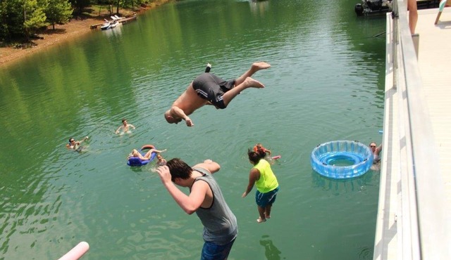 LAKE FRONT! 15 Beds, 2 kitchens, 2 living rms, HUGE dock w 2 covered boat slips!