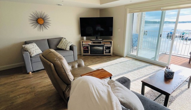 Lake front 2-bedroom condo with beautiful sun rises views over Crooked lake.