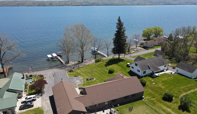 Lake front 7-bedroom house with movie theatre, hot tub, and game room!