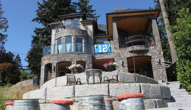 Lake Front Castle Style Custom Home Partial Lake View Balcony Suite