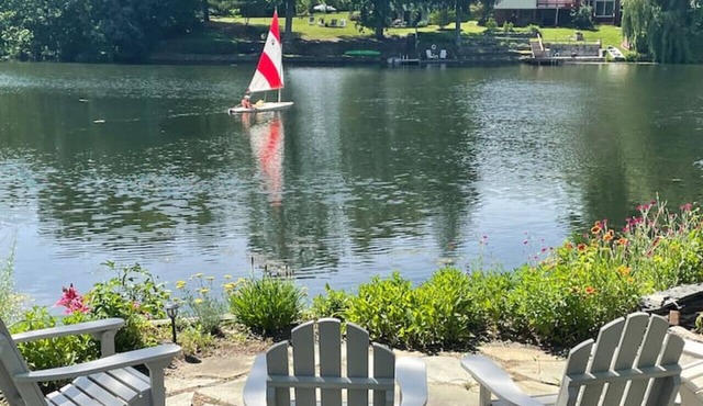 Lake Front Cottage with Sun Soaked Terraces