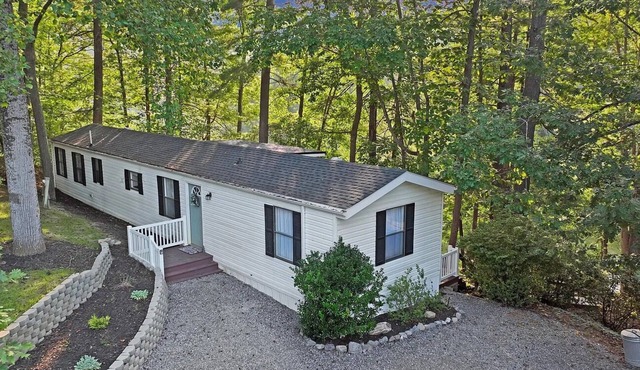 Lake front, cozy 2-bedroom 2-bath mobile home great views, large yard, 3 decks.