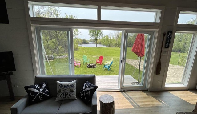 Lake front guest house with sandy beach minutes from biking and hiking trails.