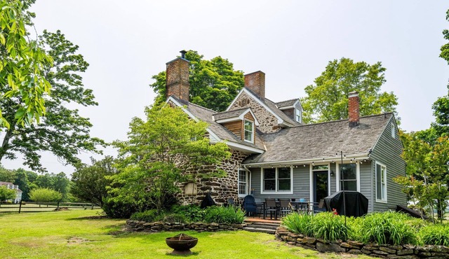 Lake front historic farmhouse on 5 acres, fenced and pet friendly!