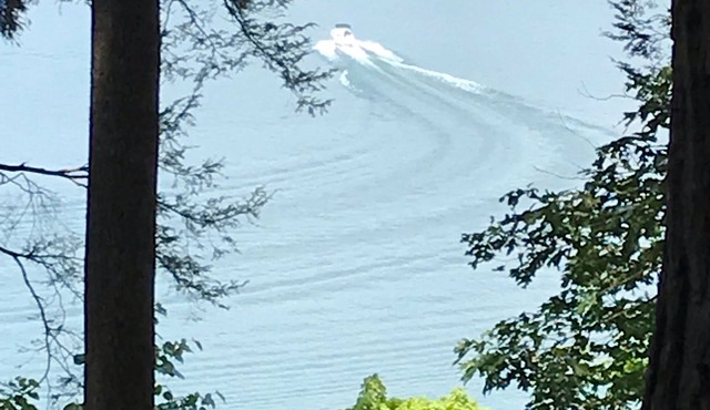 Lake Front Home with community boat ramp. Private, close to marinas and town.