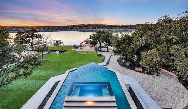 Lake Front Home with Pool, Dock, Views, Sports Court, & Beautiful Sunsets!