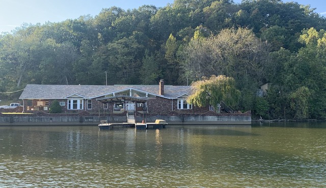 Lake Front Home with 3 steps to water, private dock, quiet cove & flat yard