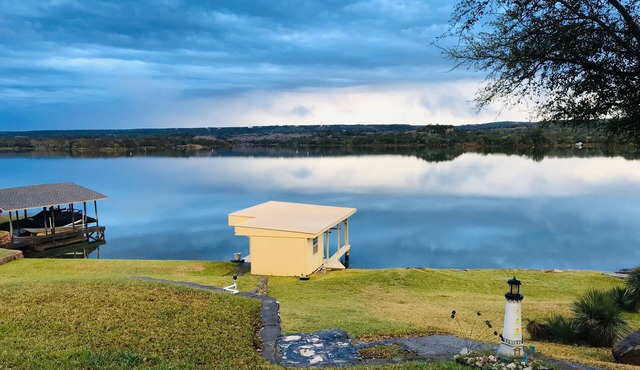 Lake Front property on Inks Lake with beautiful lake views/dock/swimming area.