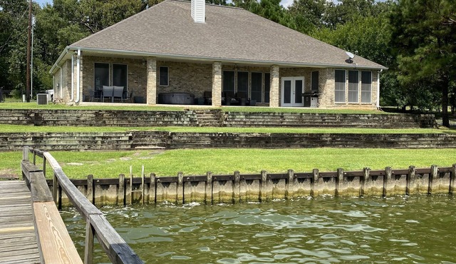 Lake front property on 3 acres offering privacy and never ending views.