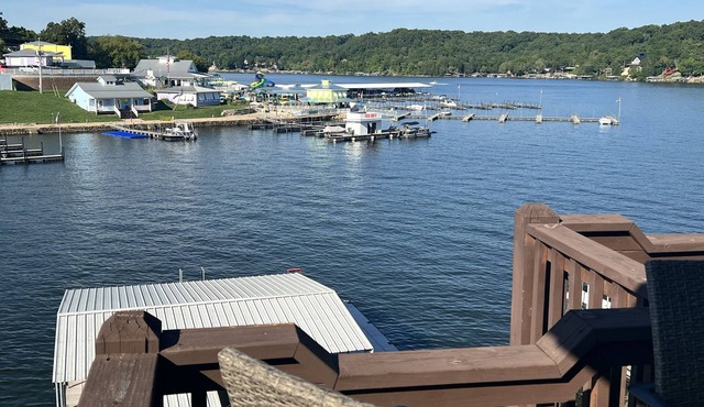 Lake front with orovate dock located in same cove as Coconuts!