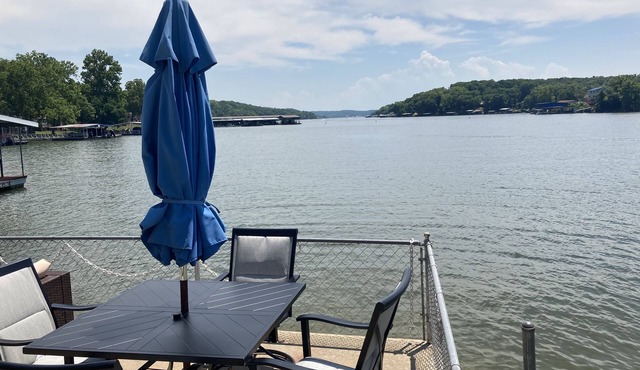 Lake front with view, dock and calm water