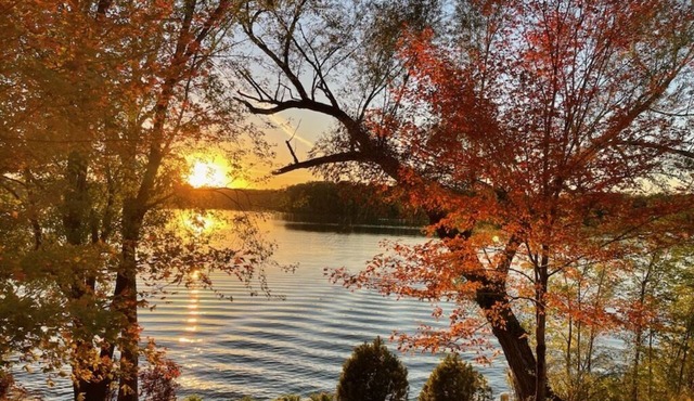 Lake home, across the street from a golf course & minutes to shopping and more!
