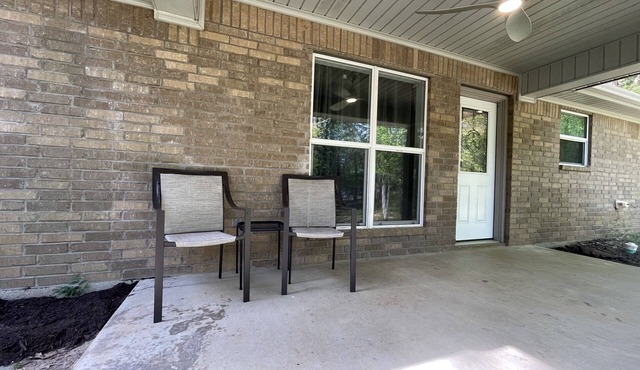 Lake house getaway on quiet Lake Hawkins with lake access and boat pier.