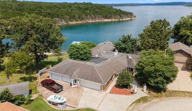 Lake house with dock access right out back. Beautiful lake views. Great fishing.