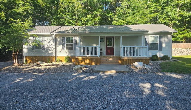 Lake House with easy water access, limited water view, sitting on 4 acres.