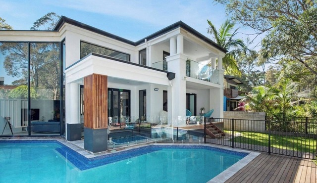 Lake house with pool and theatre room