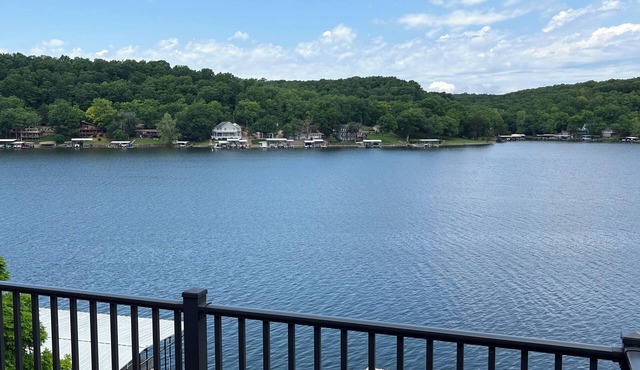 Lake house with three decks private dock and swim platform.