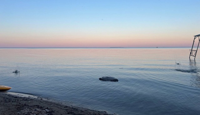 Lake Huron view just a minute walk to private sandy beach.