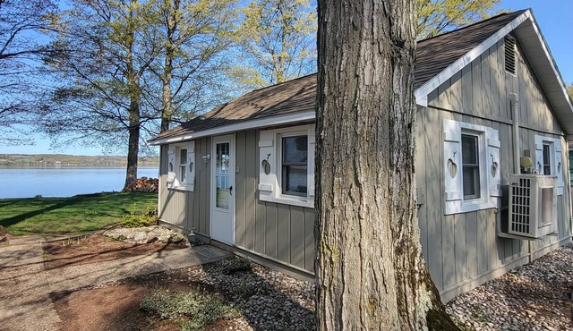 Lake Leelanau Waterfront Cottage with Mini Harbor - Close to Traverse City!