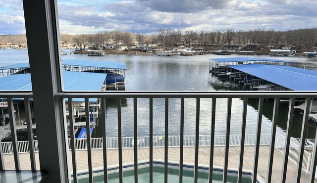 Lake Lodge Condo overlooking The swimming pool and the￼ Lake of the Ozarks
