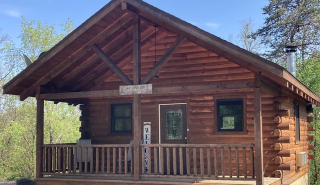 Lake Logan Hilltop Cabin with Hot Tub and Fire Pit
