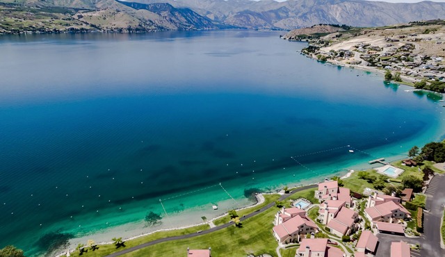 Lake & Mountain View Condo with Free WiFi, Shared Pool, Hot Tub, & Fitness Room