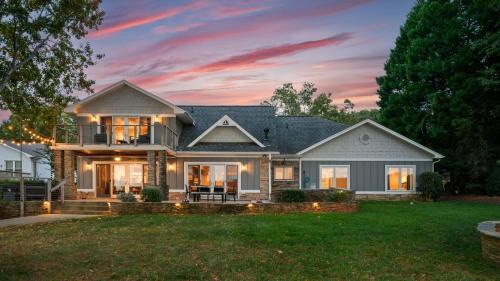 Lake Norman Lakefront w Private Beach Dock Hot Tub Fire Pit Sandy Shore by AvantStay