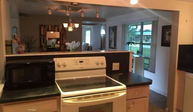 Lake Okeechobee rental on canal with dock, boat ramp & pool