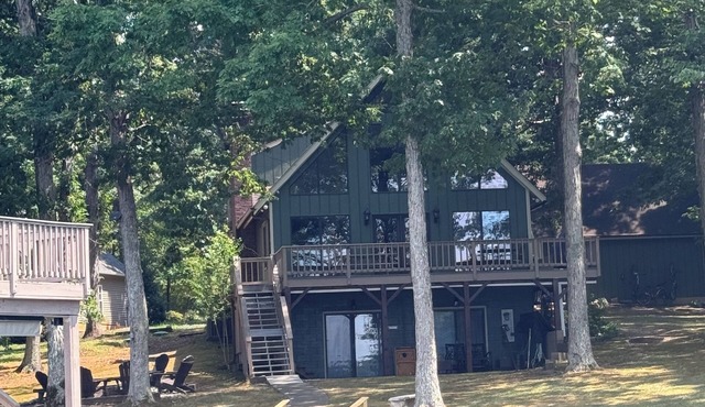 LAKE PERFECTION! Majestic views, A+ Location, TWO story dock. Pristine and comfy