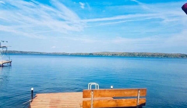 Lake Pokegama recreational cabin with private sandy beach and diving platform.